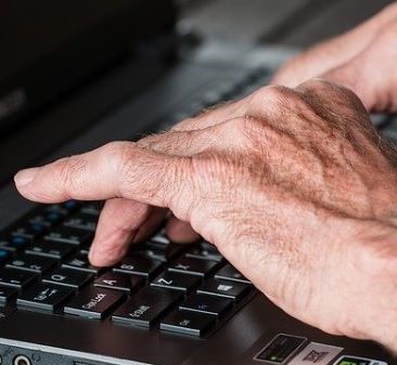 Image of hands, typing on keyboard
