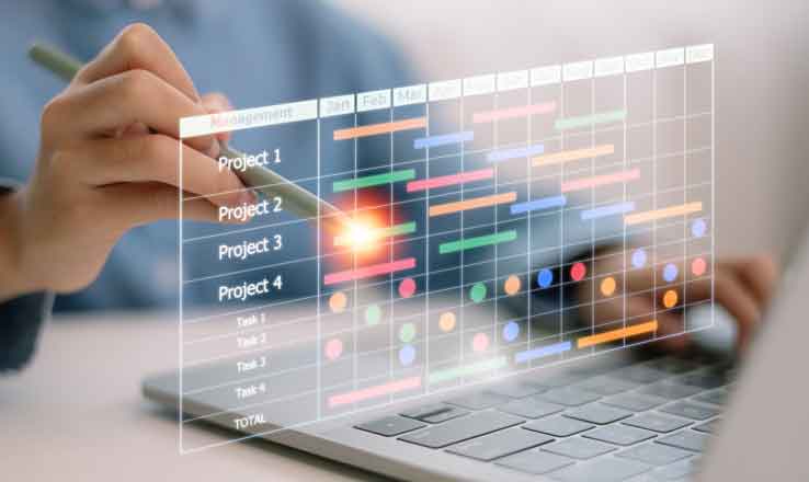 A person using a laptop with a transparent digital project management interface overlaid, showing a Gantt chart with timelines, colored bars, and task progress for multiple projects.